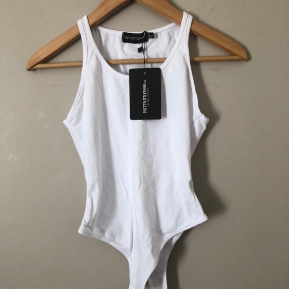 Pretty Little Thing , white body suit brand new